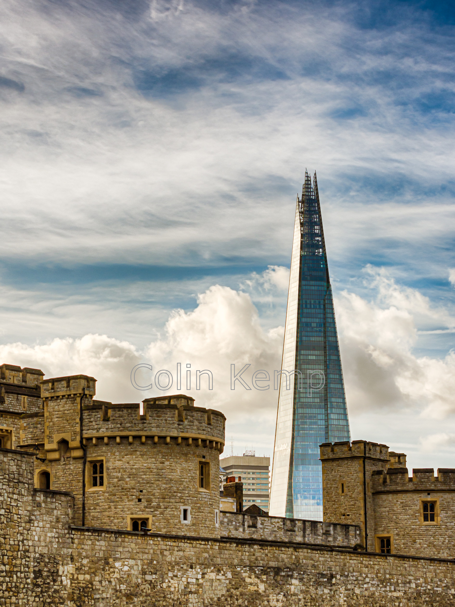 The-Tower-and-The-Shard-3698 
 The Tower and The Shard, London's architectural icons, bringing together Ancient and Modern aspects of British history in this unusual view of the London skyline. Colour photographic print available in a variety of sizes. 
 Keywords: London, Renzo Piano, Shard, Tower of London, Urban, ancient & modern, London skyline, ancient and modern London, British architectural icons