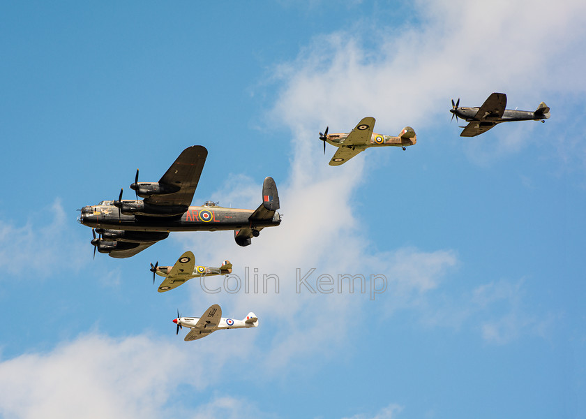 Photo-Battle-of-Britain-Memorial-Flight-Thompson-0483 
 The Battle of Britain Memorial Flight, in its Thompson formation celebrating the 60th anniversary. Part of The Machine - a collection celebrating current and classic planes and cars. Colour photograph, standard and custom sizes available. 
 Keywords: Battle of Britain, Thompson Formation, Fairford, Lancaster, Spitfire. Hurricane, air display, airshow